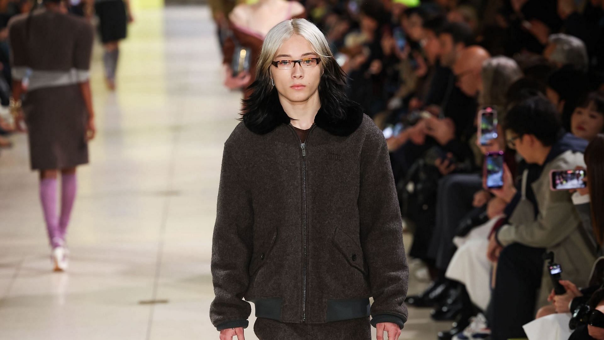 Gunner Shepardson a.k.a. Nettspend walks the runway during the Miu Miu Womenswear Fall/Winter 2025-2026 show as part of Paris Fashion Week at Palais d'Iena on March 11, 2025, in Paris, France. (Image via Getty/Victor Boyko)